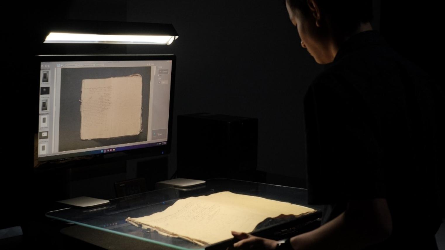 Maaike Derksen working on digitising records (photo supplied)