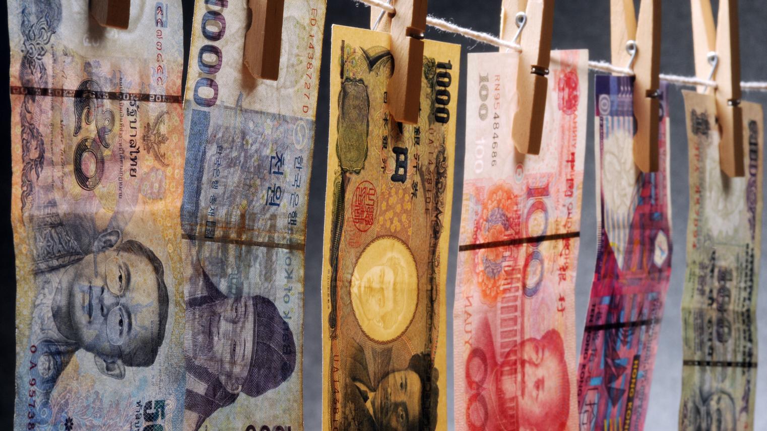 Banknotes hanging on a rope